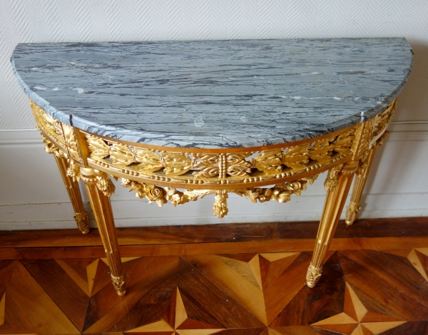 Louis XVI gold leaf gilt half-moon shaped console, late 18th century circa 1780