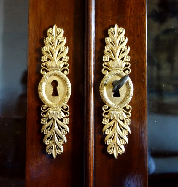 Tall Empire mahogany and ormolu book case, early 19th century