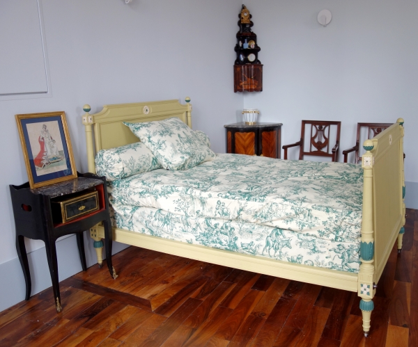 Late 18th century lacquered wood bed with full bedding, circa 1790