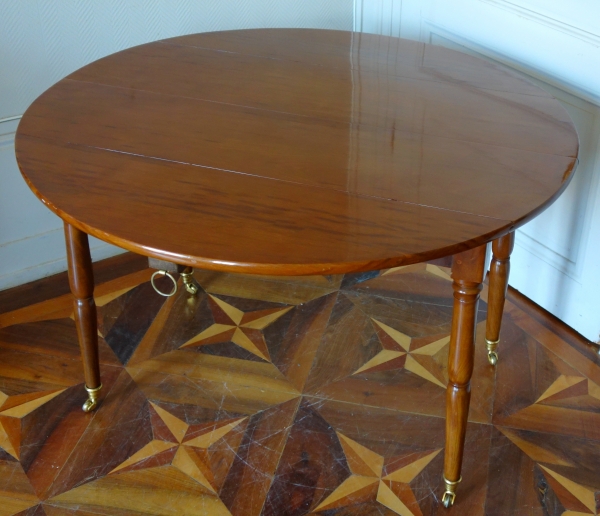 Small Empire solid mahogany dining room table, late 18th century / early 19th century