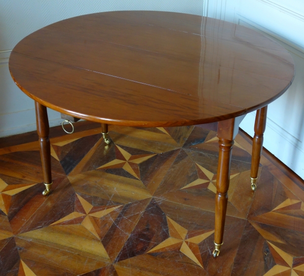 Small Empire solid mahogany dining room table, late 18th century / early 19th century