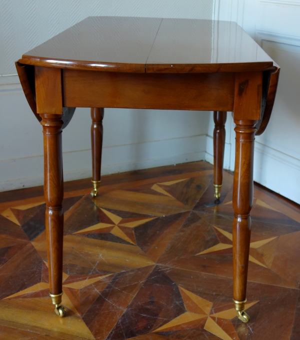 Small Empire solid mahogany dining room table, late 18th century / early 19th century