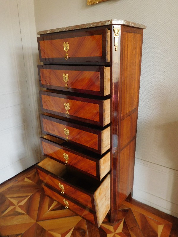 Rosewood and violet Louis XVI semainier, stamped by Dusautoy, 18th century