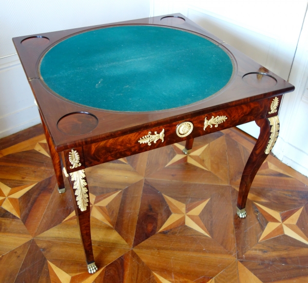 Table à jeu console d'époque Empire Restauration en acajou flammé et bronze doré au mercure