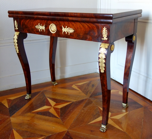 Table à jeu console d'époque Empire Restauration en acajou flammé et bronze doré au mercure