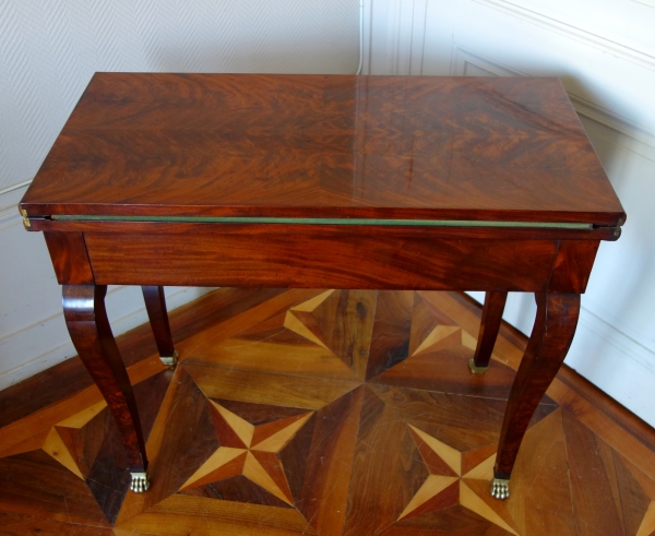 Table à jeu console d'époque Empire Restauration en acajou flammé et bronze doré au mercure