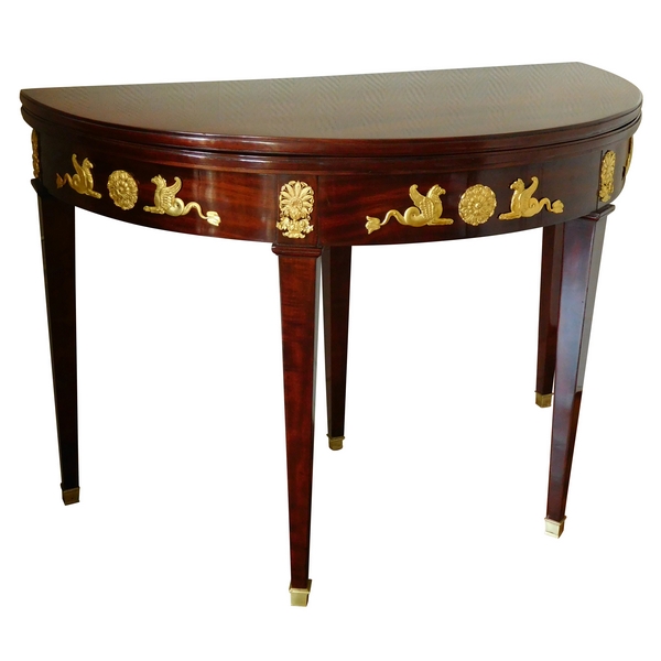 Mahogany Empire half-moon shaped game or card table, ormolu decoration, early 19th century