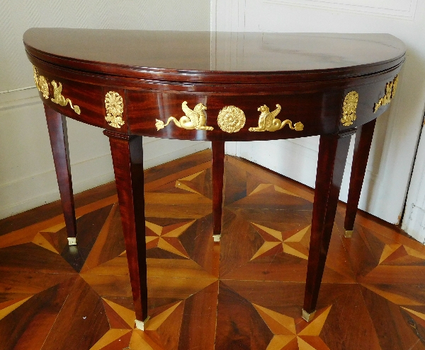 Mahogany Empire half-moon shaped game or card table, ormolu decoration, early 19th century