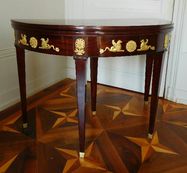 Mahogany Empire half-moon shaped game or card table, ormolu decoration, early 19th century