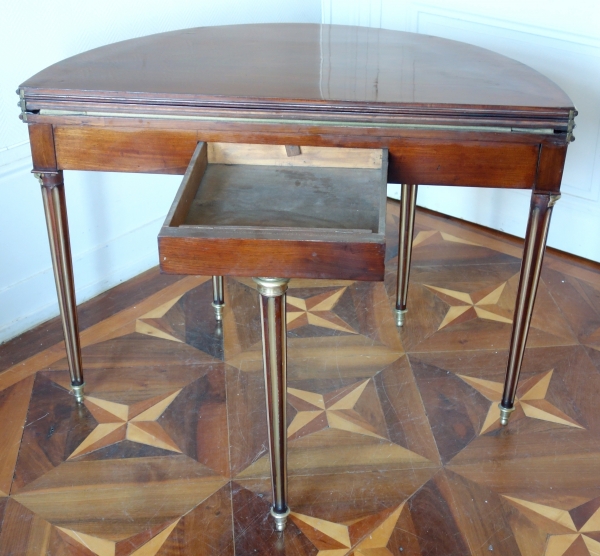 Late 18th century mahogany half-moon shaped game table / card table