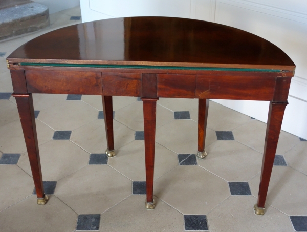 Empire half-moon shaped mahogany card table / game table, early 19th century