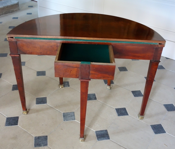 Empire half-moon shaped mahogany card table / game table, early 19th century