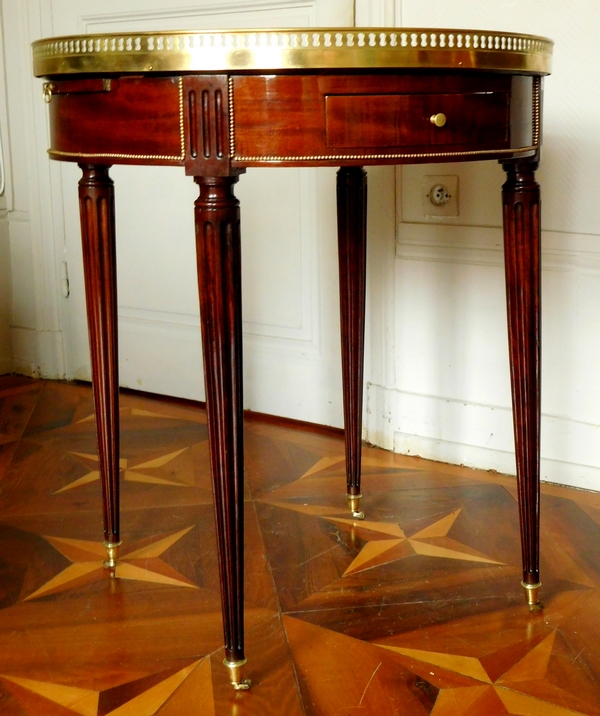 Table bouillotte de style Louis XVI en acajou et bronze doré, époque XIXe siècle