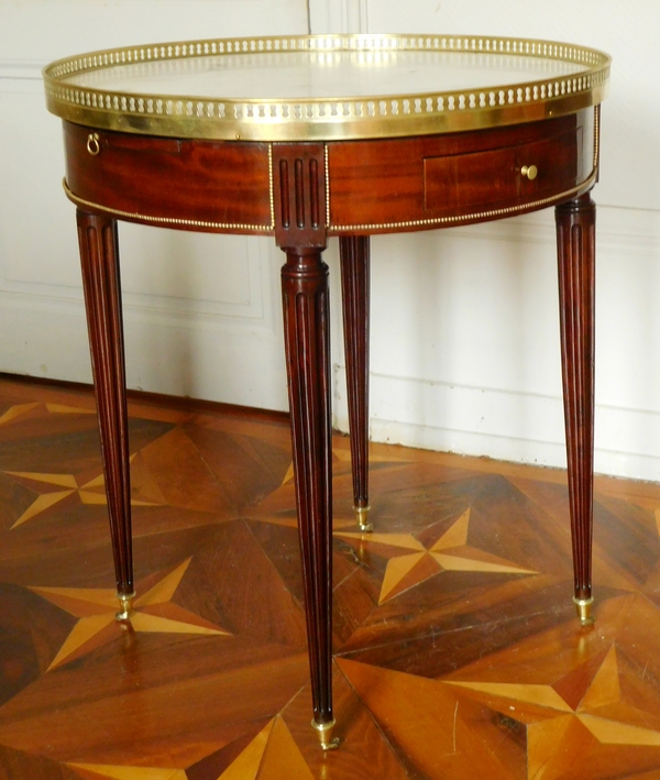 Table bouillotte de style Louis XVI en acajou et bronze doré, époque XIXe siècle