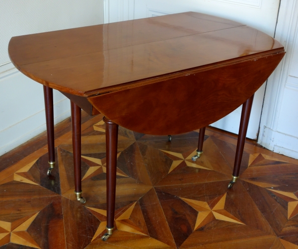 Large Louis XVI solid mahogany dining room table, early 19th century