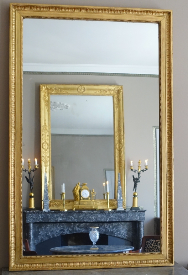 Grand miroir de cheminée Louis XVI Directoire doré à l'or fin, glace au mercure - 161cm x 102,5cm