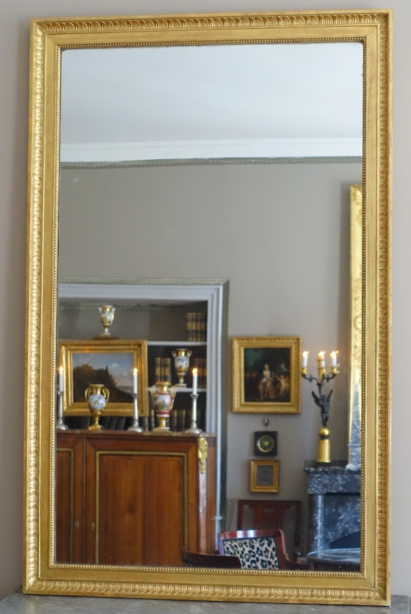 Grand miroir de cheminée Louis XVI Directoire doré à l'or fin, glace au mercure - 161cm x 102,5cm