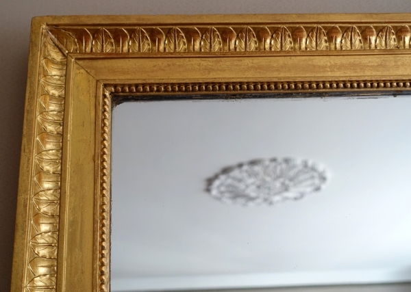 Grand miroir de cheminée Louis XVI Directoire doré à l'or fin, glace au mercure - 161cm x 102,5cm