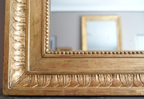 Grand miroir de cheminée Louis XVI Directoire doré à l'or fin, glace au mercure - 161cm x 102,5cm
