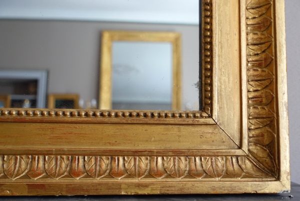 Grand miroir de cheminée Louis XVI Directoire doré à l'or fin, glace au mercure - 161cm x 102,5cm