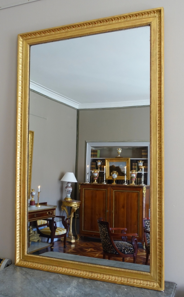 Grand miroir de cheminée Louis XVI Directoire doré à l'or fin, glace au mercure - 161cm x 102,5cm