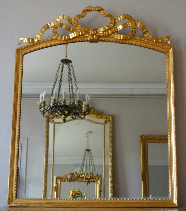 Grand miroir provençal Louis XVI en bois doré et glace au mercure - 143cm x 114,5cm