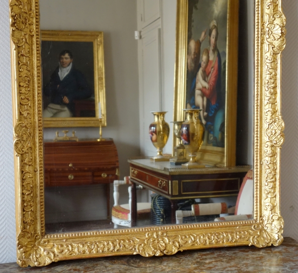 Louis XIV sculpted gilt wood mirror, mercury glass, early 18th century - 79.5cm x 159cm