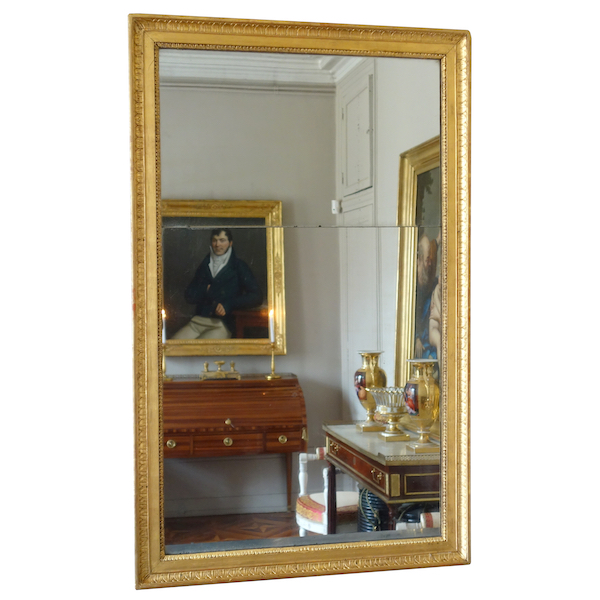 Miroir d'entre deux ou de cheminée d'époque Empire en bois doré, glace au mercure - 129cm x 80cm