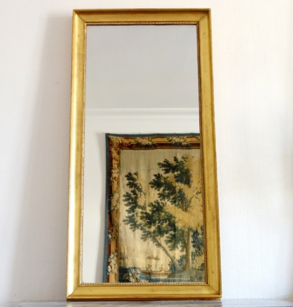 Miroir d'entre deux d'époque Empire Restauration - bois doré à la feuille d'or, glace au mercure
