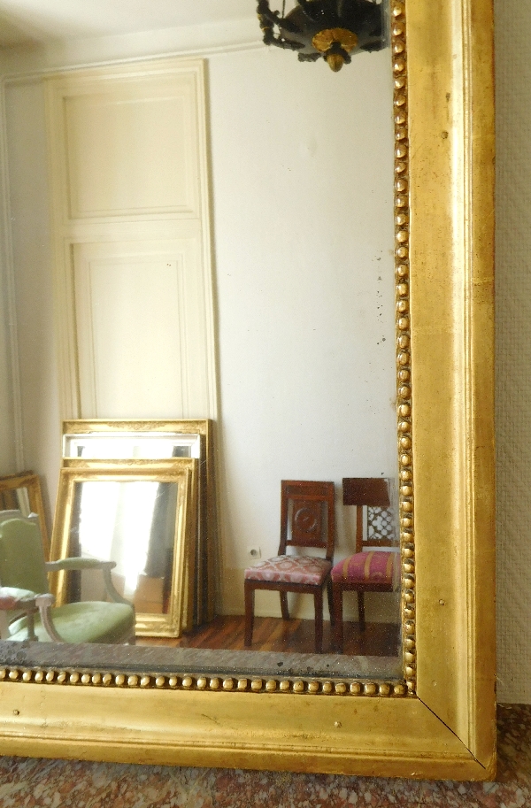 Louis XVI mirror / trumeau, gold leaf gilt wood frame, mercury glass