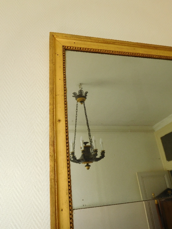Louis XVI mirror / trumeau, gold leaf gilt wood frame, mercury glass