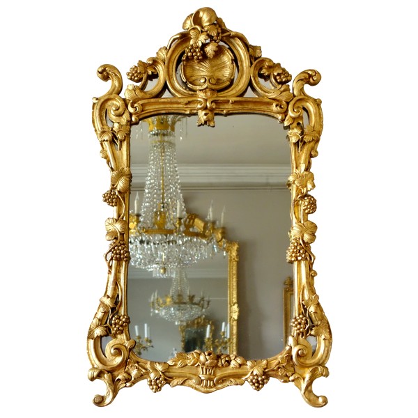 Louis XV gilt wood mirror, mercury glass, 18th century