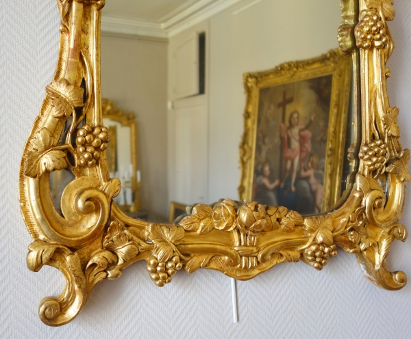 Louis XV gilt wood mirror, mercury glass, 18th century