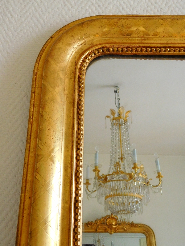 Miroir en bois doré à la feuille d'or, glace au mercure, époque Napoléon III