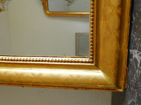 Miroir en bois doré à la feuille d'or, glace au mercure, époque Napoléon III