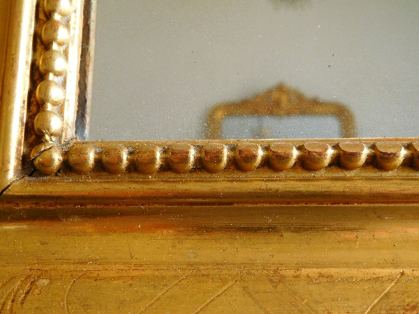 Miroir en bois doré à la feuille d'or, glace au mercure, époque Napoléon III