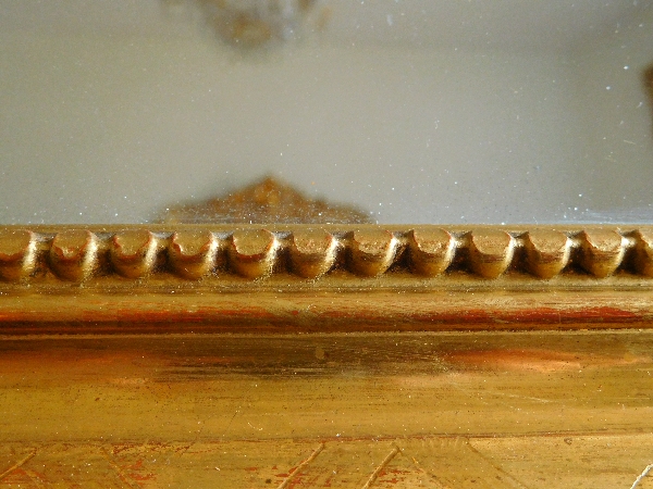 Miroir en bois doré à la feuille d'or, glace au mercure, époque Napoléon III