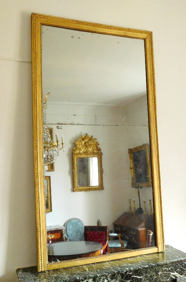 Tall Louis XVI mirror, gilt wood and mercury glass, late 18th century - 200cm