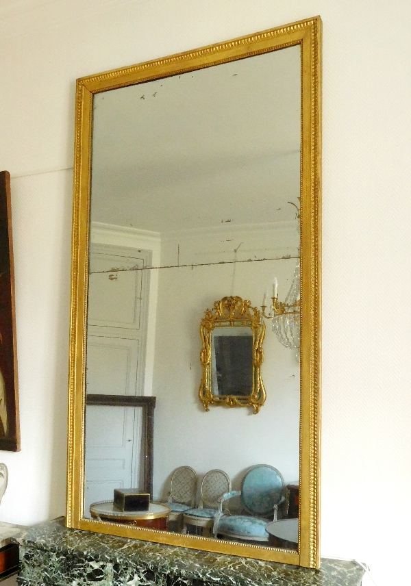 Tall Louis XVI mirror, gilt wood and mercury glass, late 18th century - 200cm