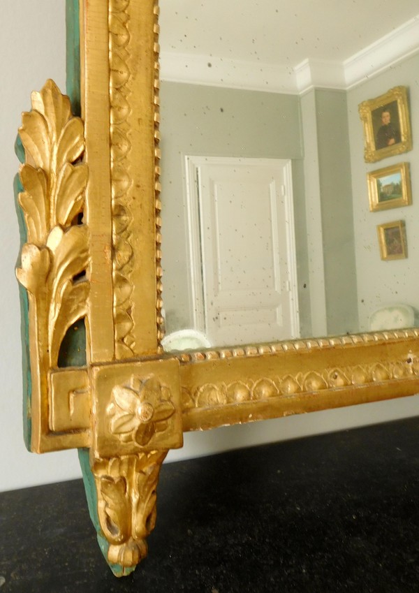 Tall mirror, Louis XVI period (late 18th century), frame gilt with gold leaf