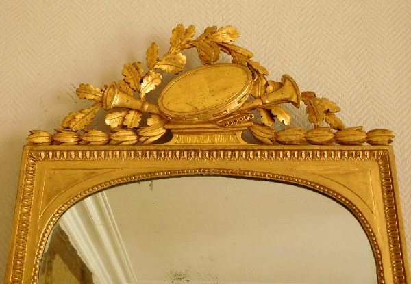 Miroir d'époque Louis XVI en bois doré au tambourin - glace au mercure biseautée 74cm x 108cm