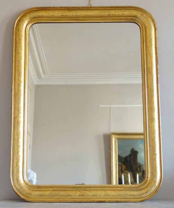 Miroir en bois doré à la feuille d'or, glace au mercure scintillante, époque Napoléon III