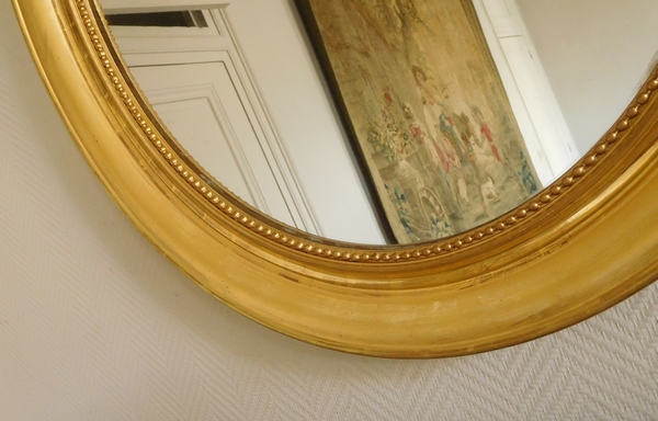 19th century oval mirror, gold leaf gilt frame, mercury glass