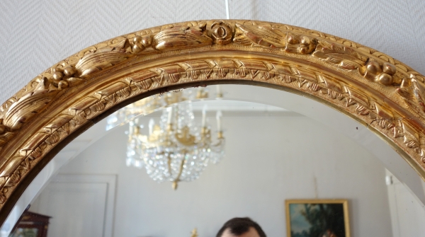 17th century oval mirror, sculpted and gilt wood frame, Louis XIII period - 95cm x 80cm