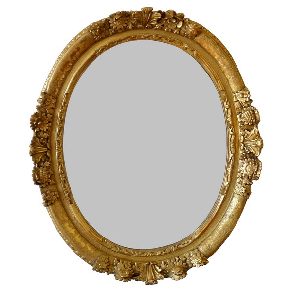 Grand miroir ovale d'époque Louis XIV fin XVIIe siècle, bois sculpté et doré 98cm x 80cm