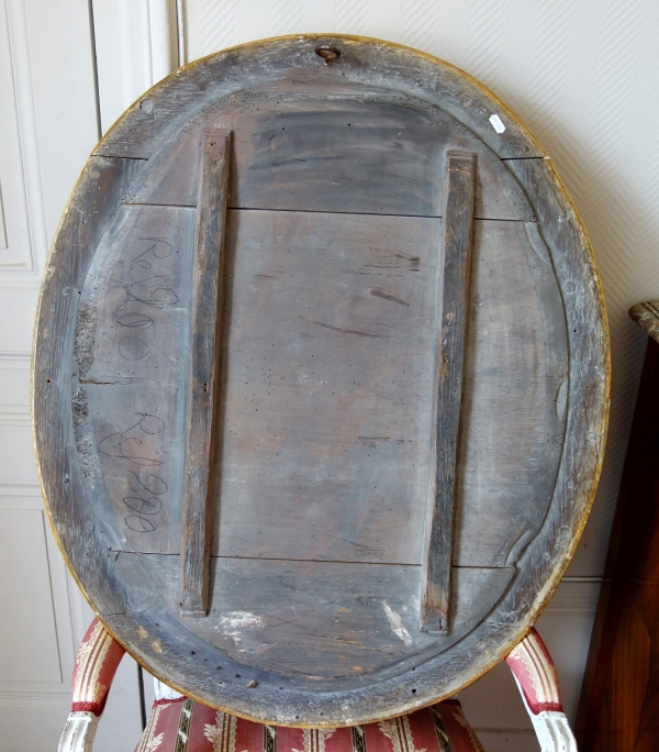 17th century oval mirror, sculpted and gilt wood frame, Louis XIII period - 98cm x 80cm