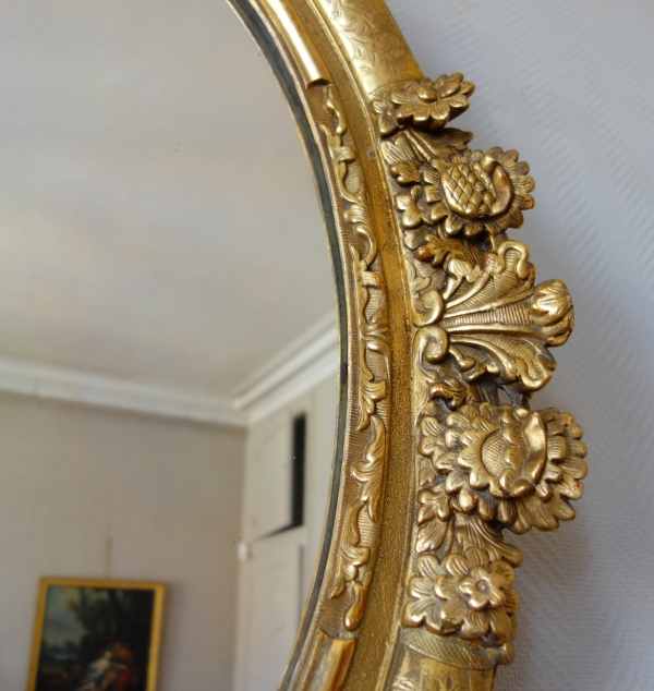 17th century oval mirror, sculpted and gilt wood frame, Louis XIII period - 98cm x 80cm