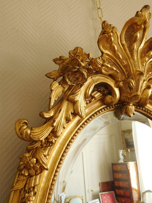 Louis XVI style gilt wood oval mirror, Napoleon III period - 19th century - 62cm X 95cm