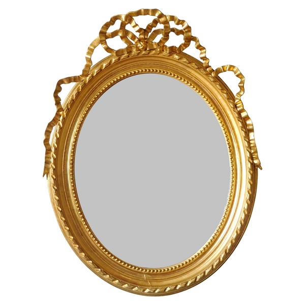 Louis XVI style gilt wood oval mirror, Napoleon III period - 86cm x 112cm