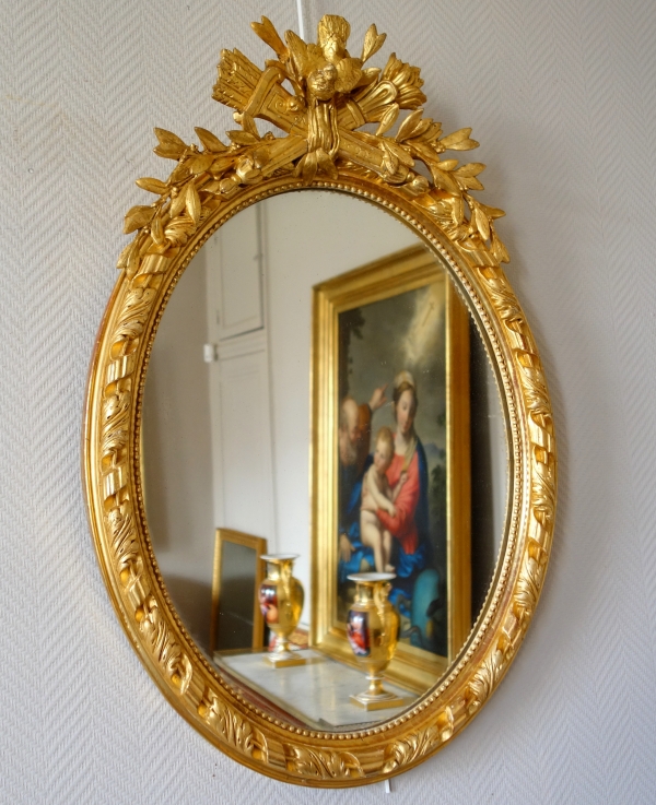 Miroir ovale en bois doré à la feuille d'or d'époque Napoleon III - 81cm x 55cm